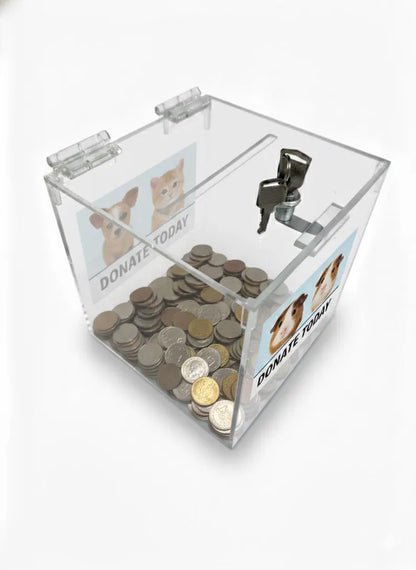 Clear acrylic donation box with coins inside, featuring 'Donate Today' text and images on a white background.